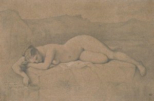 Naked woman lying on a rock